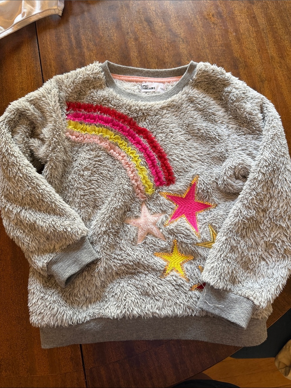 Epic Threads Cream Fuzzy Sweatshirt with Pink, Yellow & Red Rainbow Stars
